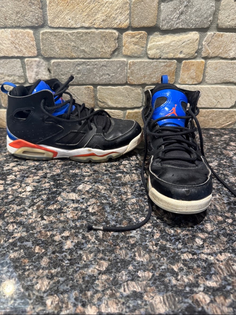 Jordan Kids High-Top Sneakers in Black and Blue with Orange Accents